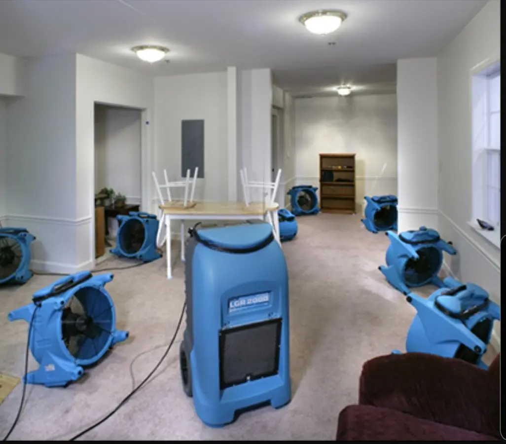 Air movers and dehumidifier setup for Water Damage Restoration in Euclid